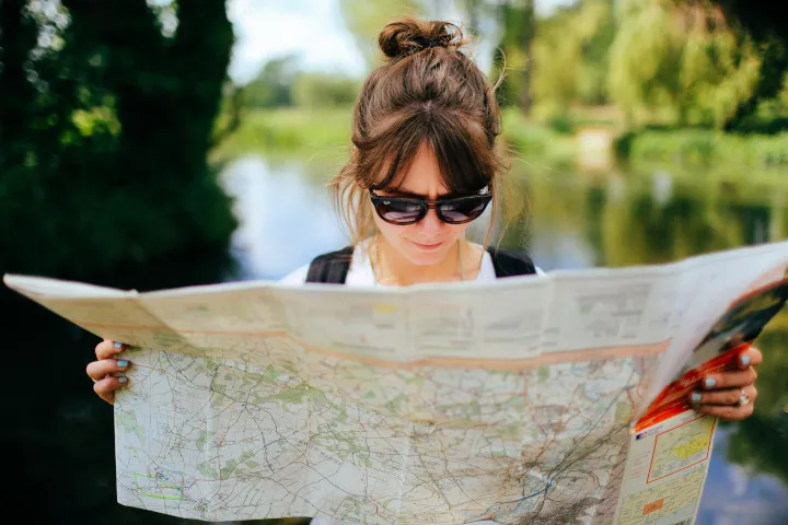 Woman looking at map